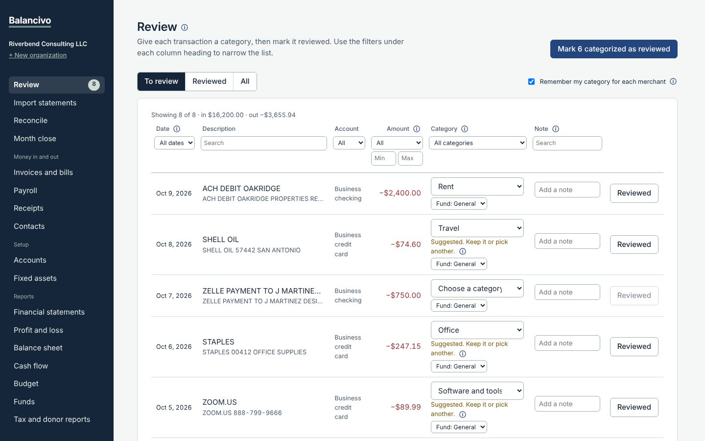 The Review page with suggested categories and a Reviewed button on each line